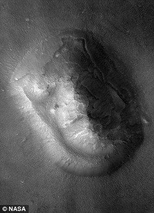 Later images showed the 'face on Mars' was just a chance alignment of shifting dust dunes (pictured)