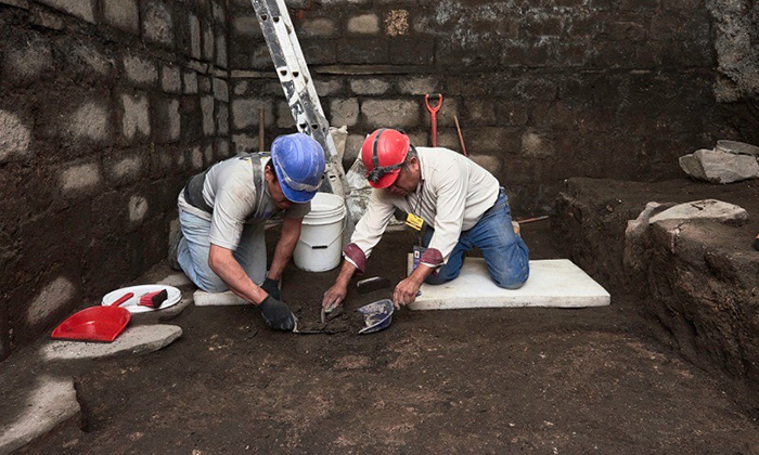 While renovating a historic building, workers stumbled upon unusual basalt slabs.