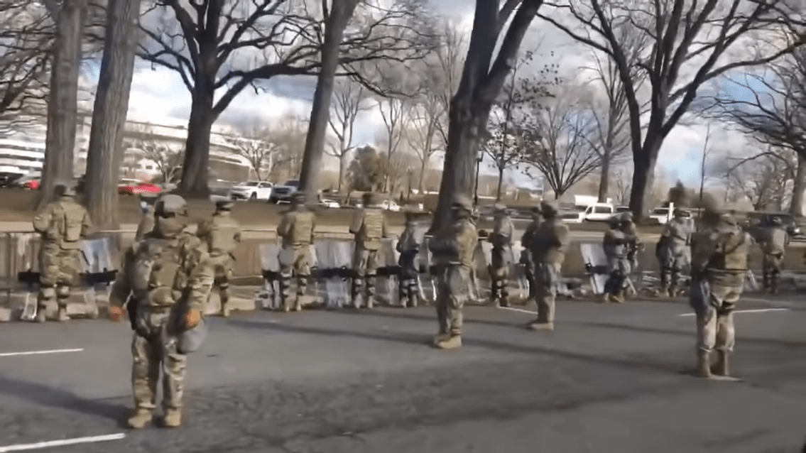 Why did the National Guard turn their backs on Biden, and why did the Washington Monument go out?